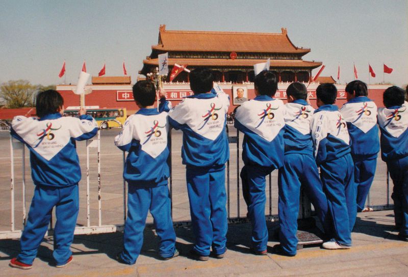 In 2001, logos for Beijing's application to host the 2008 Summer Olympic Games could be found on many primary students' uniform