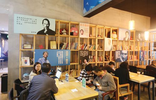 Inside an incubator on Inno Way, aspiring entrepreneurs exchange ideas under posters of Steve Jobs, Bill Gates, Jack Ma and other tech innovators